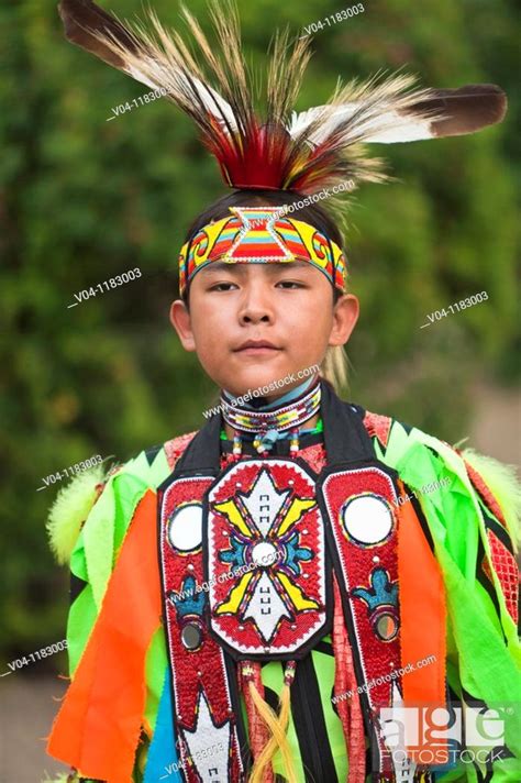 Native American In Traditional Costume At A Powwow In Alberta Canada