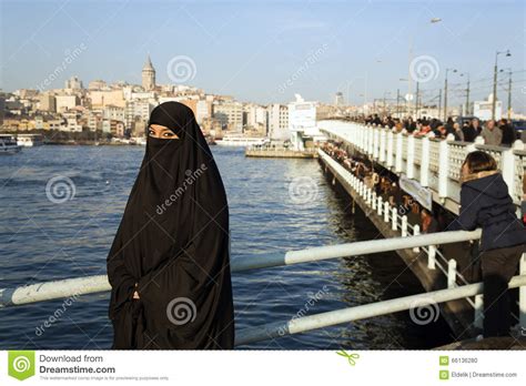 Woman Dressed With Black Headscarf Chador On Istanbul