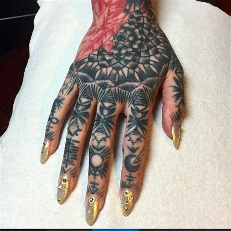 feminine hand tattoos phyle style