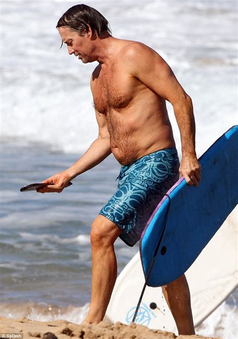 hercules star kevin sorbo packs a paunch as he hits the beach on a