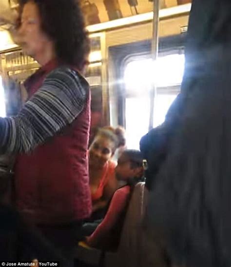 racist mother launches into frightening tirade against asian woman on nyc subway daily mail online