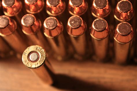 crop brass colored bullet lot weapon bullet magnum ammunition hd wallpaper