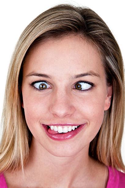 Cross Eyed Women Sticking Out Tongue Behavior Pictures Images And