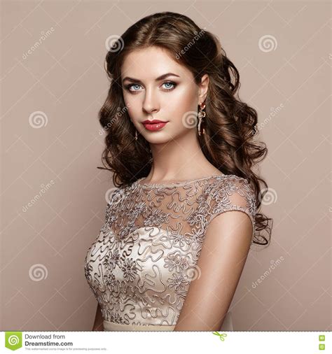 Fashion Portrait Of Beautiful Woman In Elegant Dress Stock Image