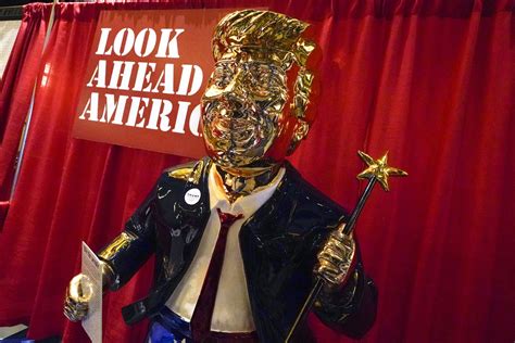 conservatives  cpac praying  gilded statue  donald trump lord  oregonlivecom
