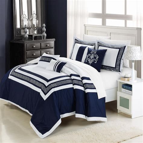 white bedding  blue accent white  navy blue embroidered