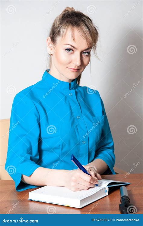 Gorgeous Young Beautiful Doctor Working In The Office Stock Image