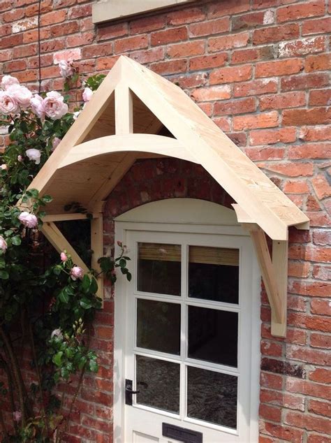 timber front door canopy porch crossmerehand  shropshire awning