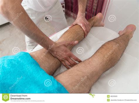 man having legs massage in a spa center stock image image of