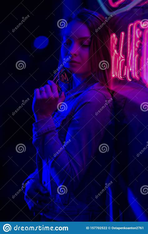 Creative Sexual Portrait Of A Girl In Neon Lighting With