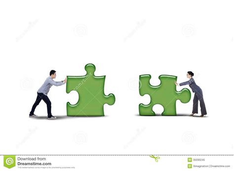 Isolated Business Partner Putting Together Two Puzzle
