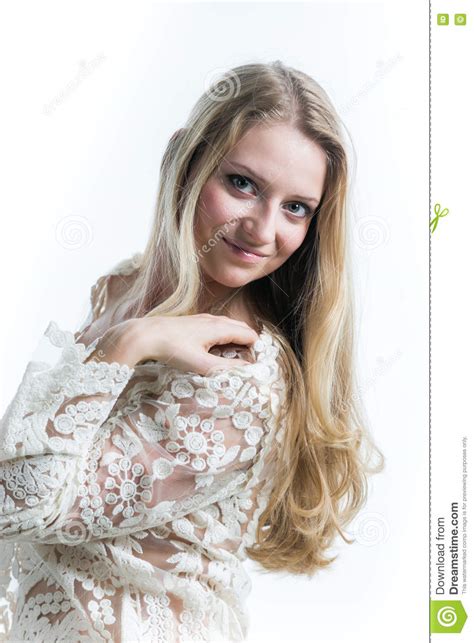 beautiful russian blonde girl on a white background in a white