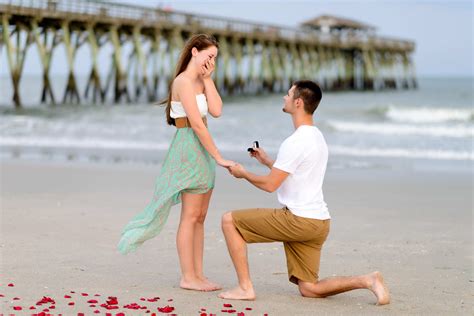 emotional marriage proposal   young couple  myrtle beach