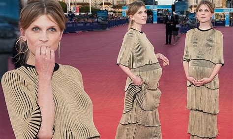 glowing clémence poésy reveals her pregnancy as she debuts sizeable