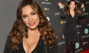 Kelly Brook Shows Off Cleavage In Low Cut Dress As She