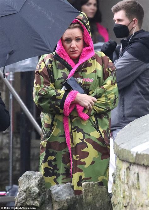 Daisy May Cooper Bundles Up In Camouflage Coat While Filming For Her