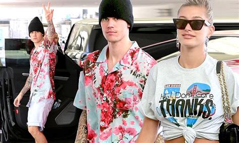 justin bieber looks laid back as he cruises around in hot pink lamborghini with wife hailey baldwin