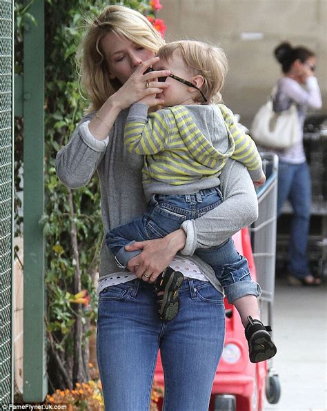 january jones helps son xander try out her sunglasses during a fun grocery trip daily mail online