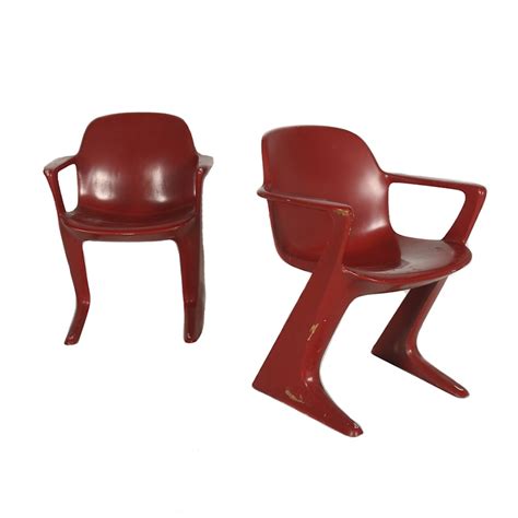 mid century modern molded plastic chairs  red ebth