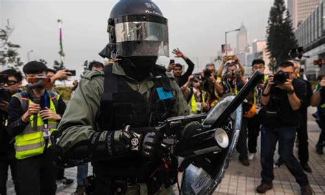 hong kong police clash with protesters after uighur rally hong kong