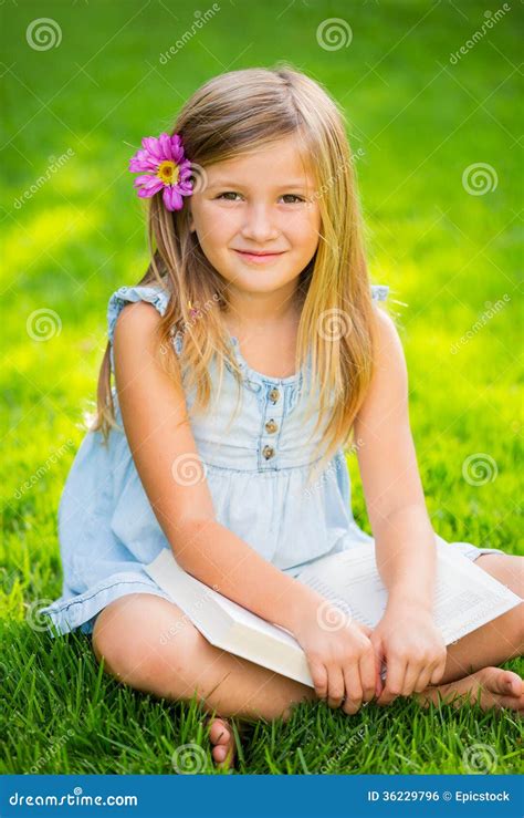 adorable cute  girl reading book stock photo image   book