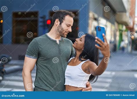 Man And Woman Interracial Couple Making Selfie By Smartphone At Street