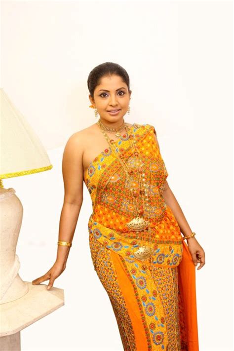 Slactress Dilhani Ashokamala Red Saree Style