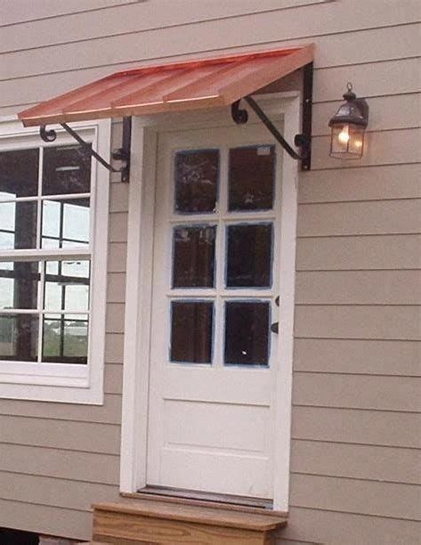 pin  tad devitt  stuff   door awnings awning  door garage door design