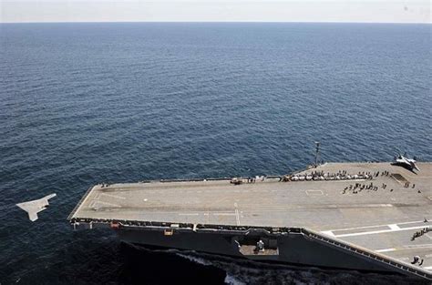 navy launches   drone   aircraft carrier  geek church