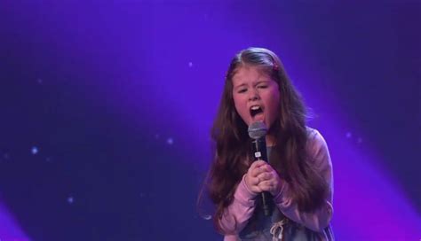 adorable eight year old looks like an angel but sings like