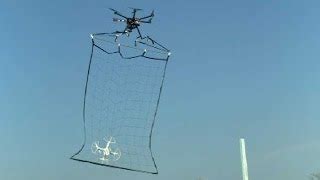 net wielding tokyo police drone  capture  shame  drones