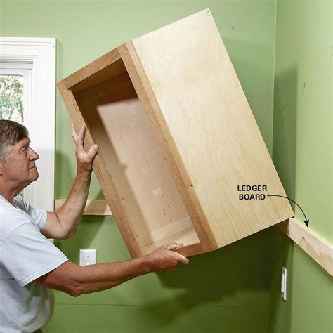 installing kitchen cabinets diy image
