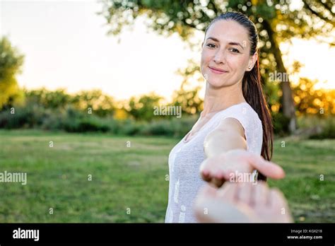 Woman Reaching Up To Camera – Telegraph