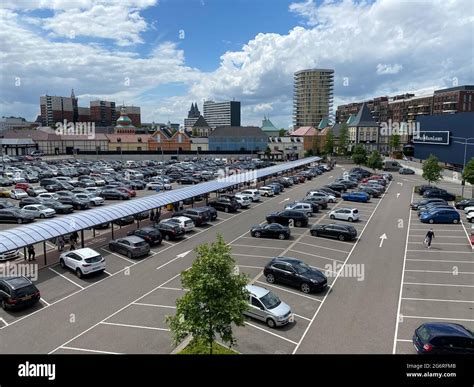 roermond netherlands july   aerial view  car parking area  buildings  designer