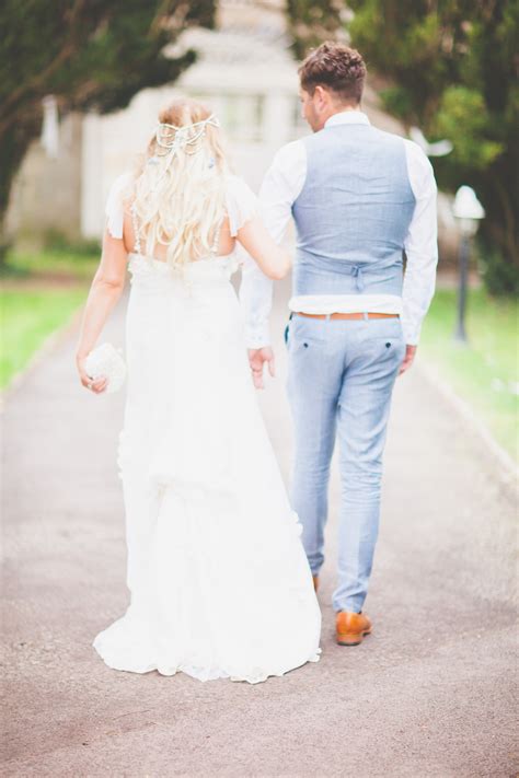 bride in vintage rose wedding gown with mis match pastel bridesmaid dresses for a whimsical