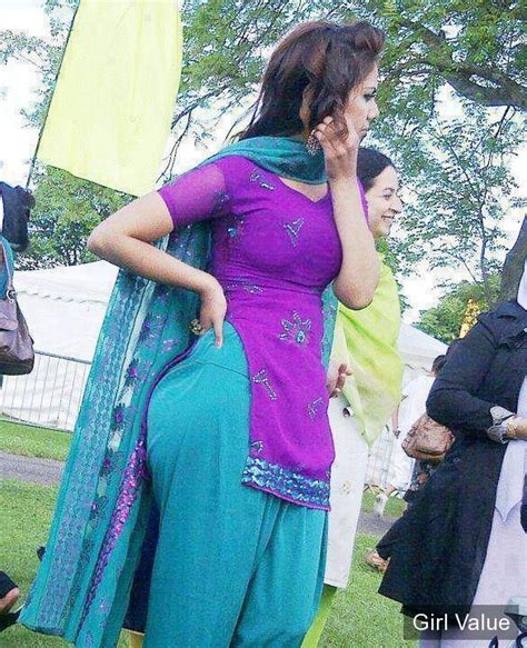 bold punjabi girl in tight sky salwar and magenta kameez
