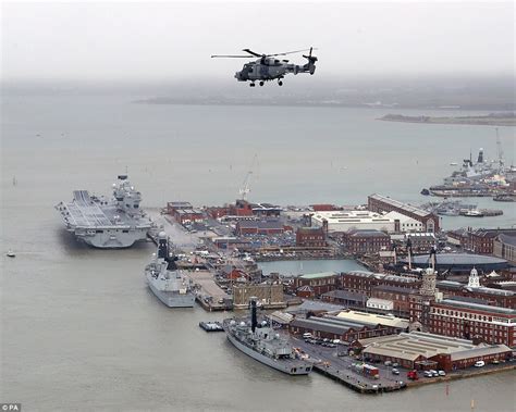 the queen welcomes hms queen elizabeth into the royal navy daily mail online