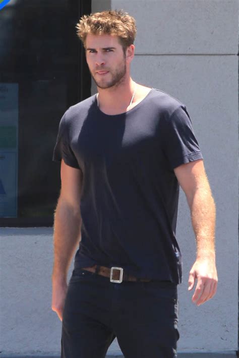 liam hemsworth looks good while out in malibu as miley cyrus is photographed in cute coveralls