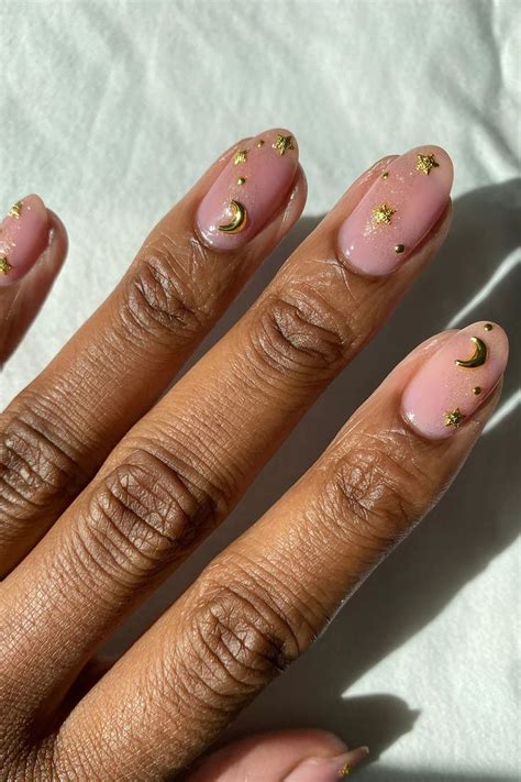 celestial charms   studded nails star nail art pretty nail