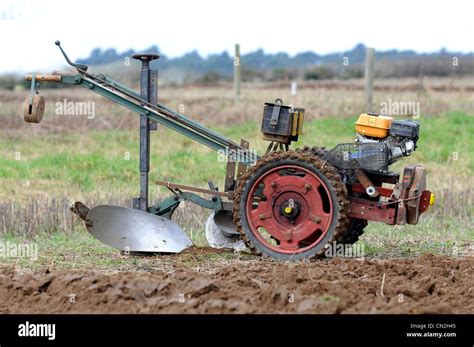 walking tractor  wheel tractor ploughing plough stock photo alamy