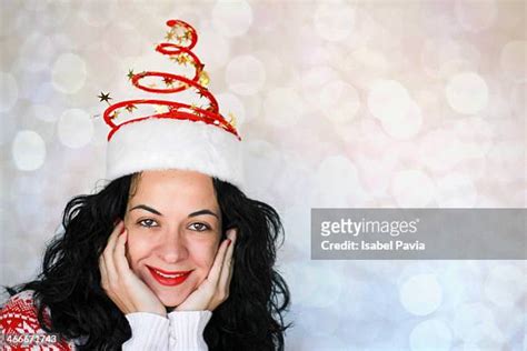 female cosmetic santa hat   premium high res pictures getty