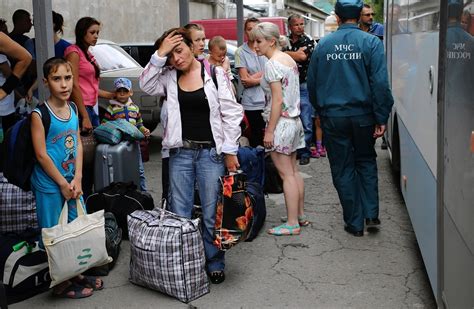 Thousands Of Ukrainian Refugees Flee To Russia For An Uncertain Future