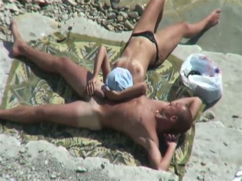 horny amateur milf riding her man s dick on a beach