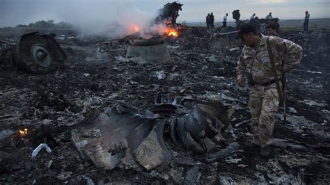 Malaysia Airlines Mh17 Plane Crash Relatives Touch Wreckage