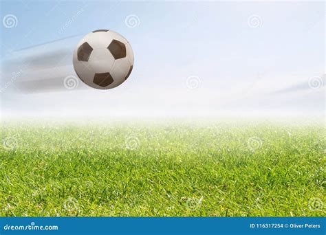 flying soccer ball stock photo image  garde grass