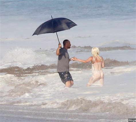 Lady Gaga Flaunts Her Butt Gets Dunked By Waves During Lingerie Photo