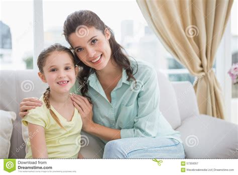 cute mother and daughter smiling at camera stock image image of around domicile 57359357