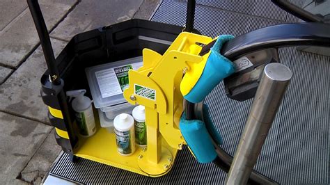 thomsens escalator handrail cleaning system youtube