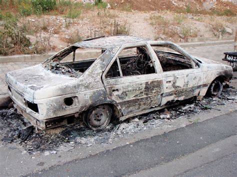fileheavily damaged car beirut lebanon unrest   jpg wikimedia commons