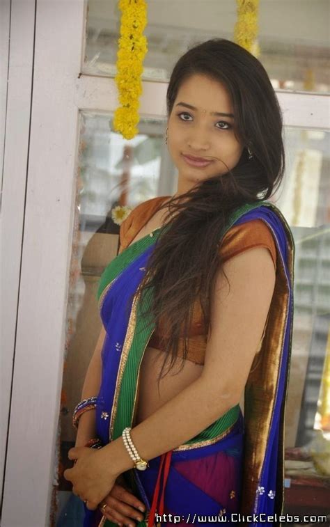 Santoshini Photoshoot In Green Half Saree Stills Celebrity At Your Clicks